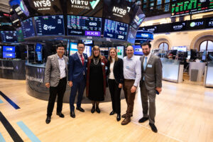 President Poon, Dean Smith, COO Kiralla, and other LMU leaders on the Trading Floor, NYSE