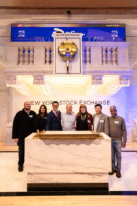 President Poon, Dean Smith and other LMU leaders below the trading bell, NYSE