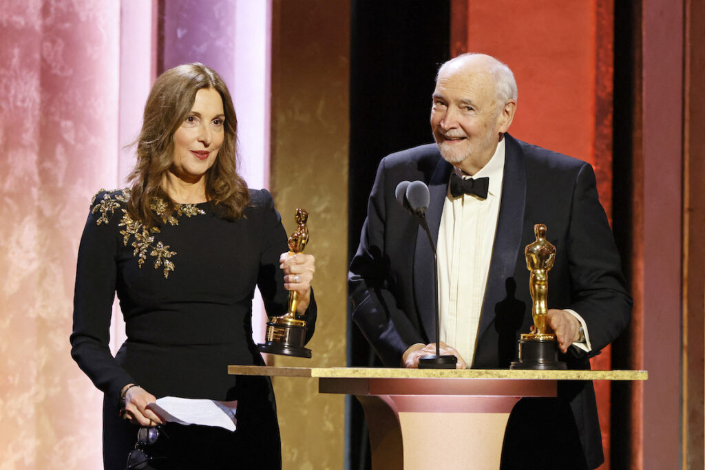 Barbara Broccoli ’81 (left) and Michael G. Wilson receive the Academy’s Irving G. Thalberg Memorial Award at the 2024 Governors Awards in Los Angeles. Broccoli is the legendary James Bond producer and namesake of LMU’s Broccoli Theater. (Photo: Etienne Laurent / AFP)