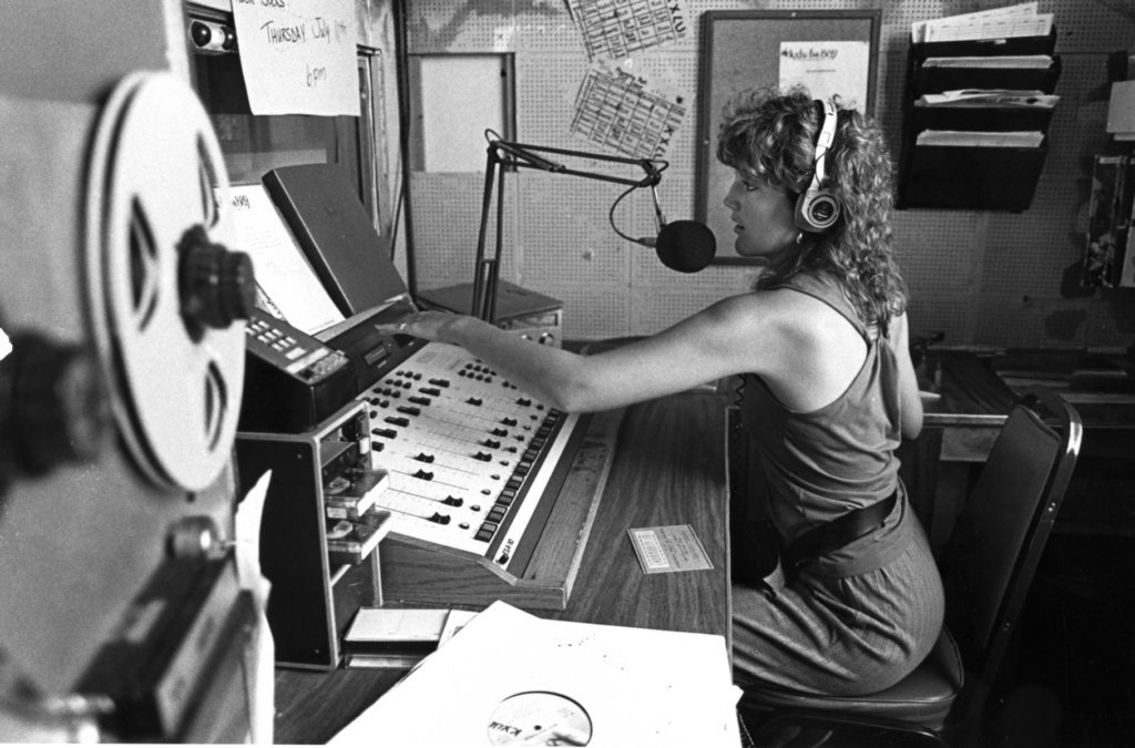 KXLU DJ with Audio Mixer