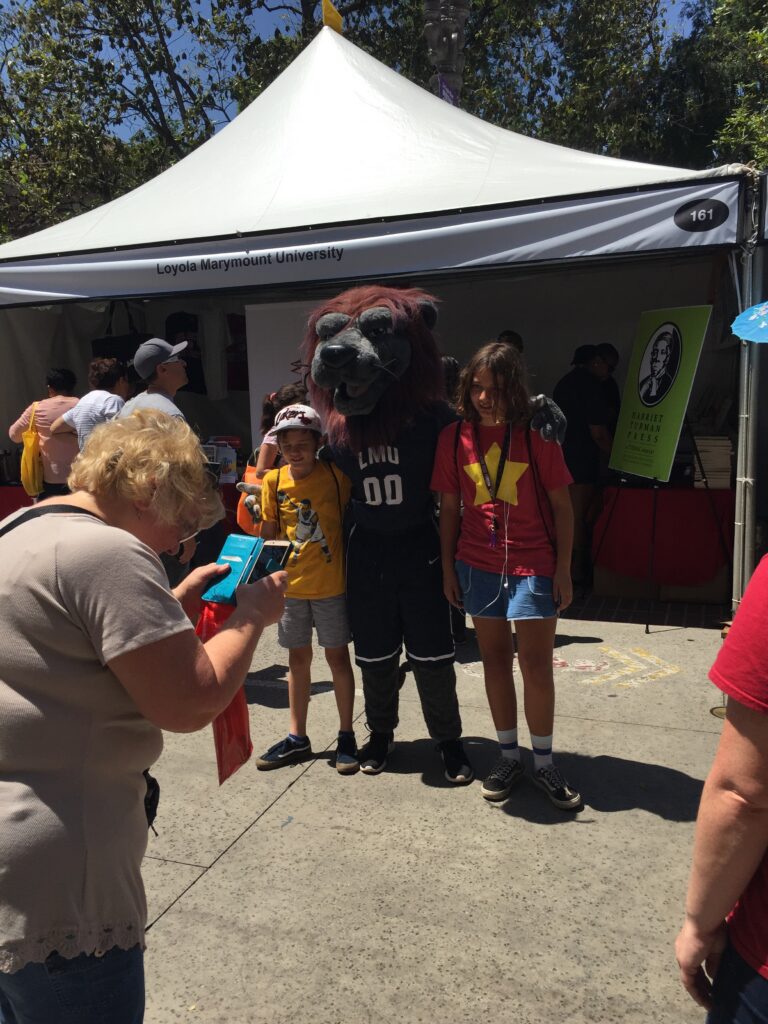 Passersby stop to see Iggy