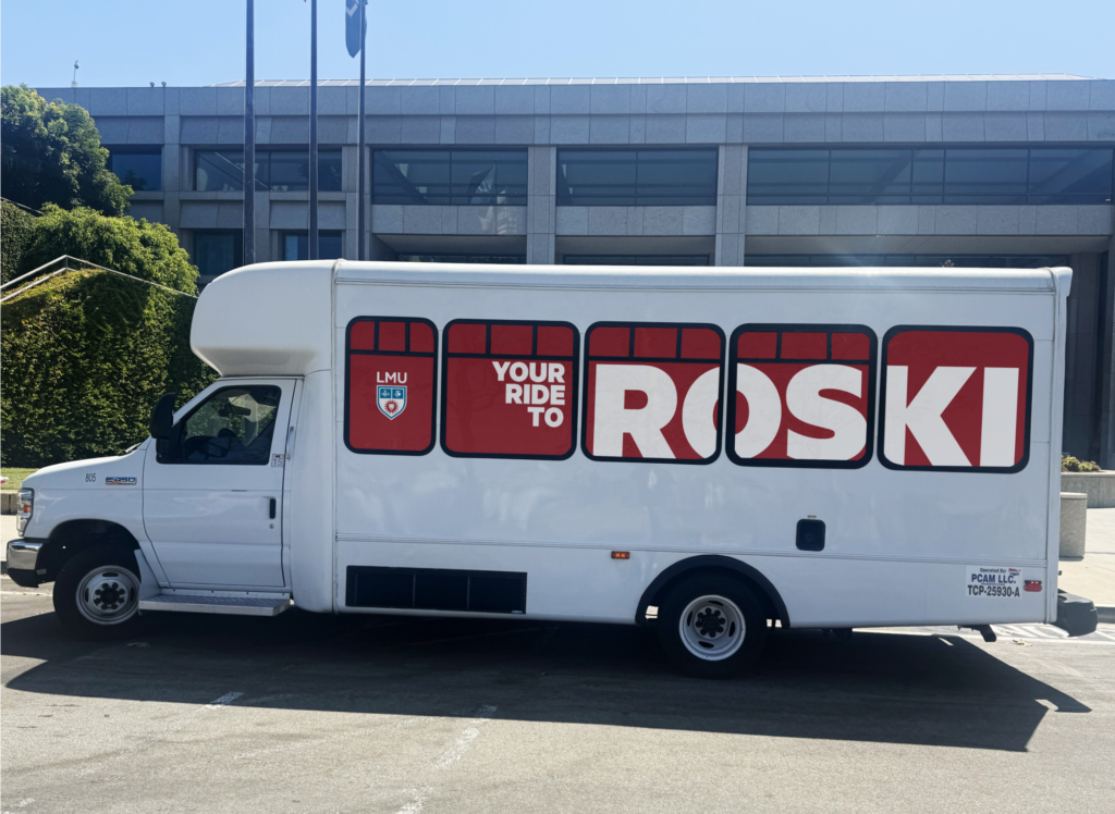 Directional signage for the Roski Dining Hall shuttle during the Lair renovation.