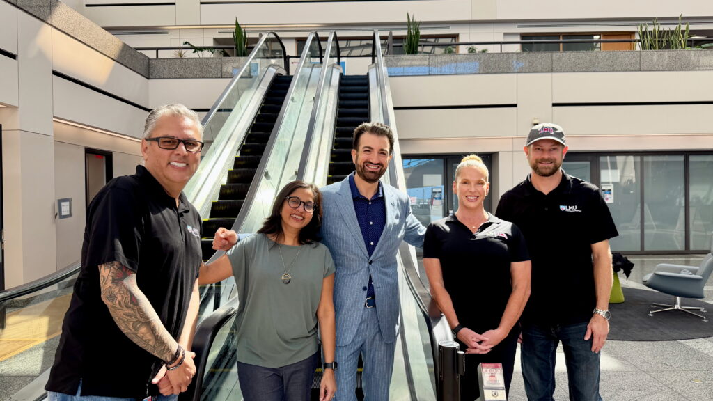 FMP Crew Posing with Newly Installed Escalators